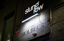 Photo of neon sign that says Slung Low at The Holbeck