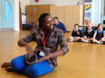 Image of  Lillian Mbabazi leading a school workshop in Blackpool