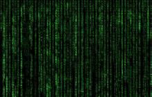 The matrix code; green lettering falling down a dark background