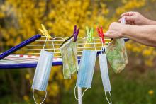 face masks drying on a washing line