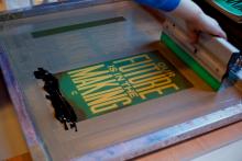 Photo of screenprinting poster of ‘Our Future is in the Making’