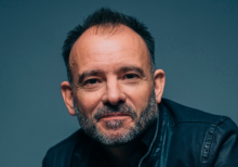 Matthew Warchus, a white man with short dark hair and a beard