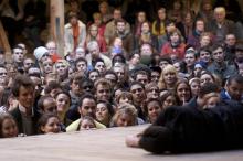 'Groundlings' at Shakespeare's Globe Theatre enjoy a performance from the yard