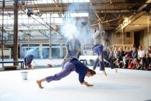 Photo of dancers in industrial setting