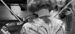 Girl learning violin