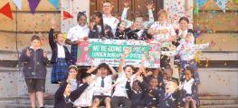 Schoolchildren from Wandsworth celebrating the announcement