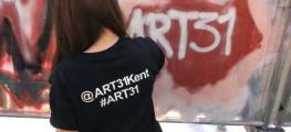 Photo of girl painting graffiti