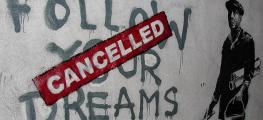 The slogan "follow your dreams" overwritten with "cancelled"