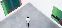 Photo of man in empty gallery