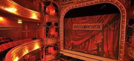 The interior of Theatre Royal Stratford East showing the stage with the safety iron down