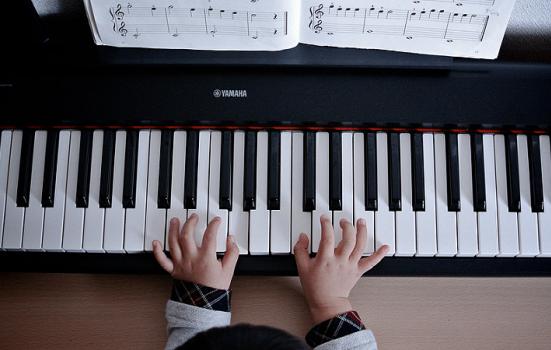 Photo of child piano