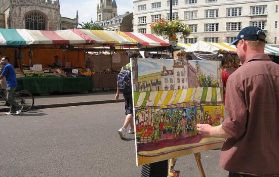 Photo of man painting in Cambridge's Market Square