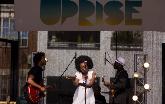 Photo of Miss Baby Sol and band at the Uprise Festival