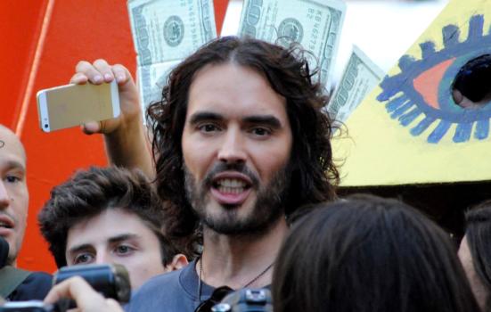 Russell Brand in a crowd of people