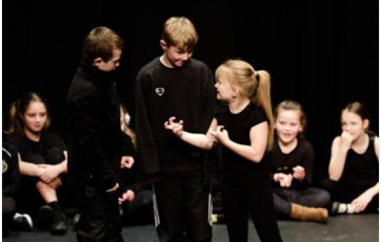 Image of children performing 