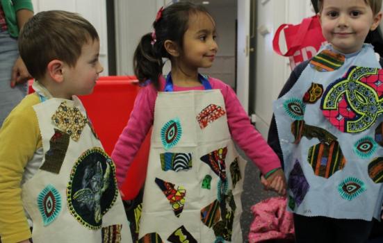 Photo of children in aprons