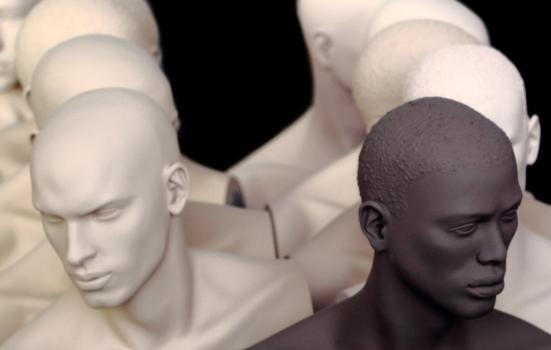 Diverse heads sculpture