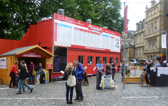 People standing near the Assembly box office at the Edinburgh Fringe Festival