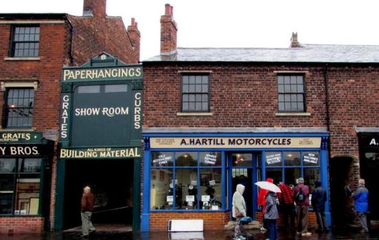 People outside a shop which is an exhibit at the Black Country Living Museum