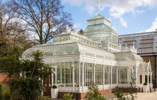 An ornate white conservatory