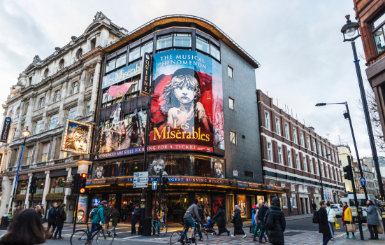 Shaftesbury Avenue in London, on the West End. The photo shows an advertisement for production Les Misérables
