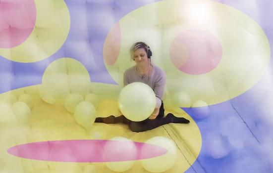 Jo Burnham surrounded by balloons