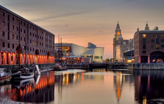 The river mersey on Liverpool Albert Dock at sunset, stock photo.