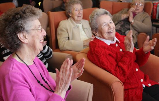 Photo of elderly people celebrating