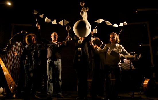 Picture shows puppeteers in a performance of 'Half of Me'