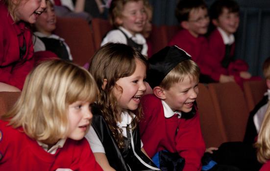 Photo of young children at a theatre performance