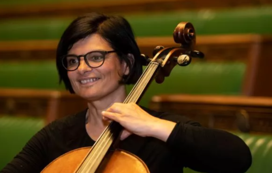Image of Culture Secretary Debbonaire playing the cello