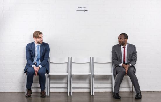 Two men waiting for an interview