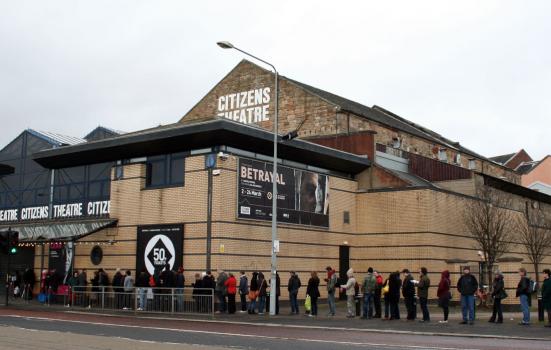 A photo of a queue of people outside Citizens Theatre, Glasgow