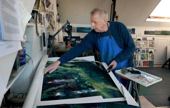 Image of artist Francis Bowyer working in his studio