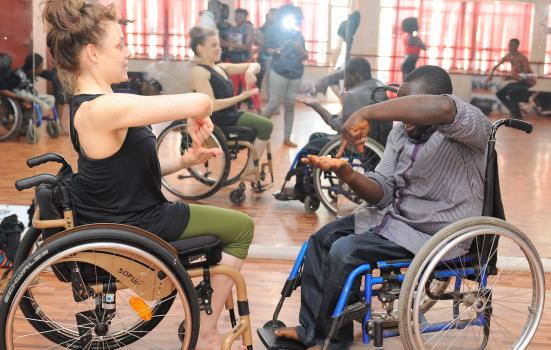 Photo of dance workshop with wheelchairs