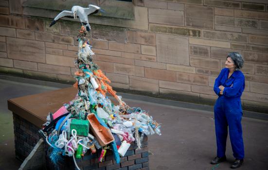 Artist Gail Dooley stands next to her sculpture at The Liverpool Plinth