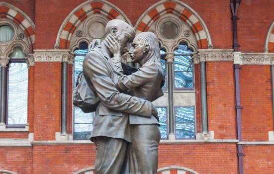 Photo of statue of two people embracing
