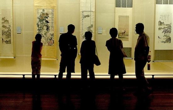 Photo of people in a museum