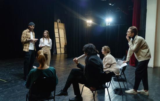 Image of actors in a rehearsal room