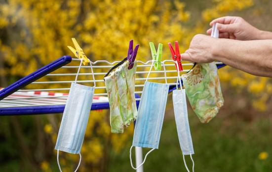 face masks drying on a washing line