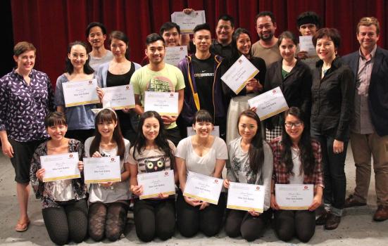 Photo of people with certificates