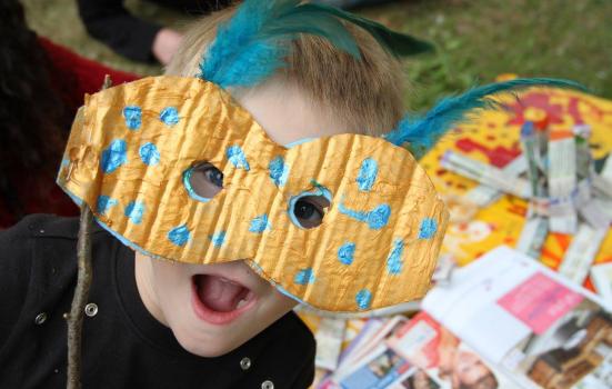 Photo of child wearing handmade mask