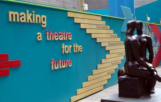 Southbank centre with statue situated in front of a wall displaying the words 'making a future for the theatre'