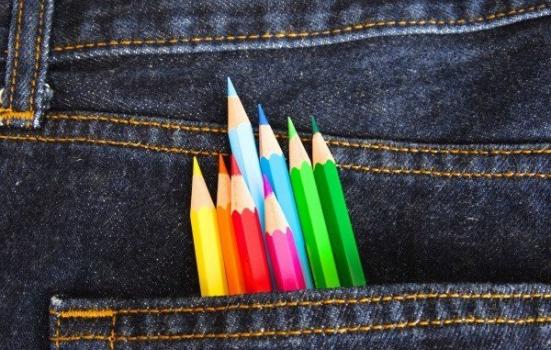 Photo of coloured pencils in jeans