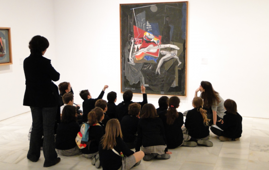 Children and Teachers look at an Abstract Painting