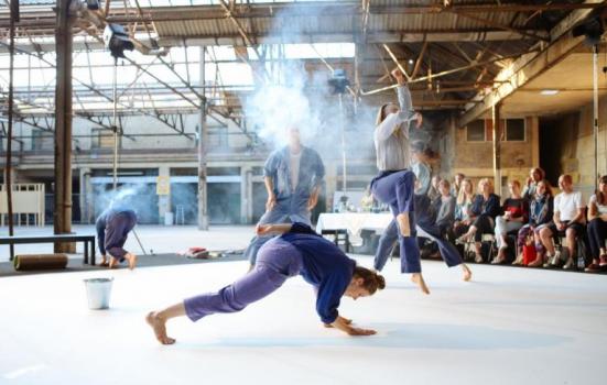 Photo of dancers in industrial setting