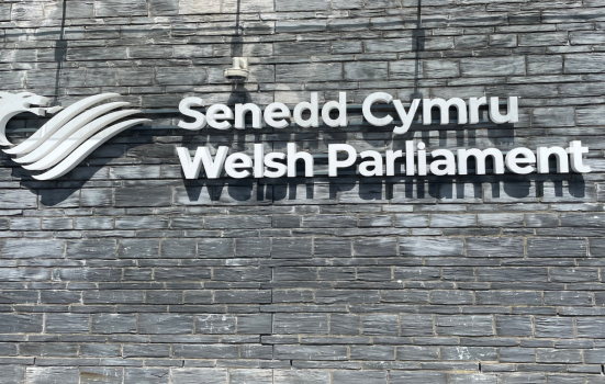 Senedd Cymru - Welsh Parliament signage outside the Senedd building