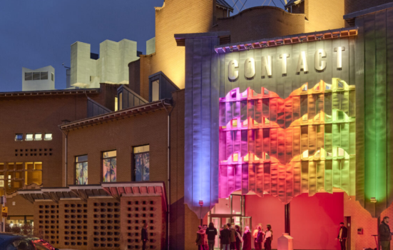 Exterior of Contact Theatre, Manchester lit up at night