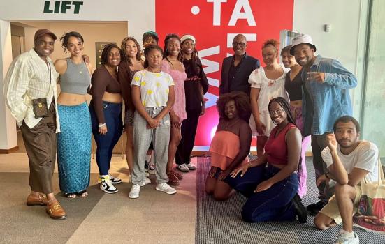 Group of Black students posing in Talawa theatre