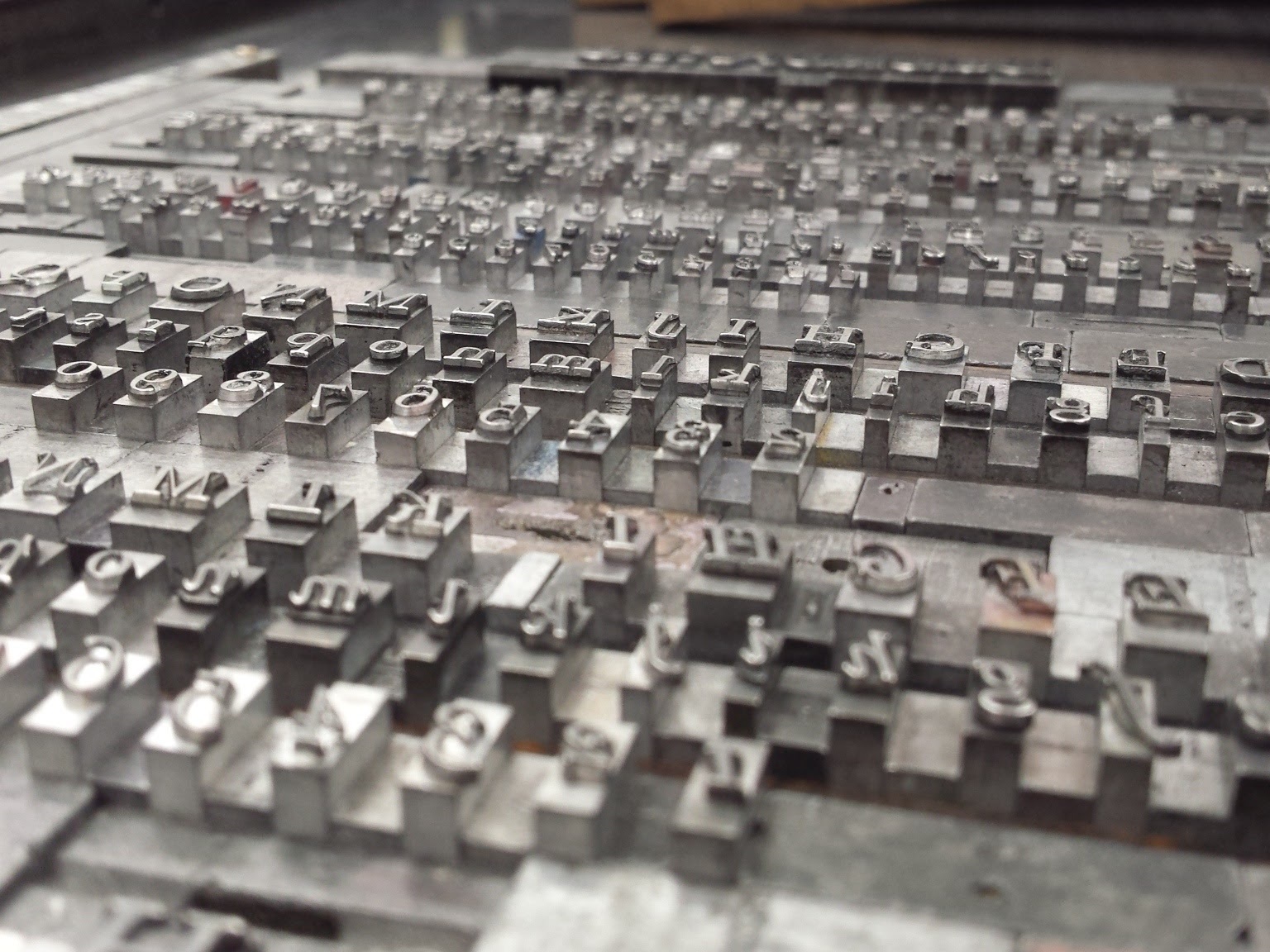 Today was a quiet day at the UWE letterpress studio, so I cracked on with a project I recently started. It might seem a bit too ambitious, but my plan is to print a specimen book of all our letterpress type. We have about 120 cases of lead type, and 90 of the wooden type – so it’s definitely a long term project. But it would make life a lot easier for the students. At the moment they have to look through every case individually while trying to decipher what the minute, inky, reversed letters will look like!